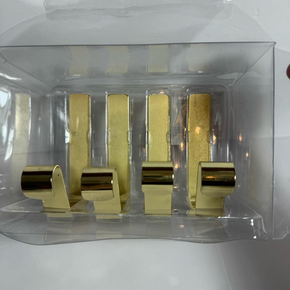 4 Ashland christmas stocking holders. Gold tone metal stocking or decor